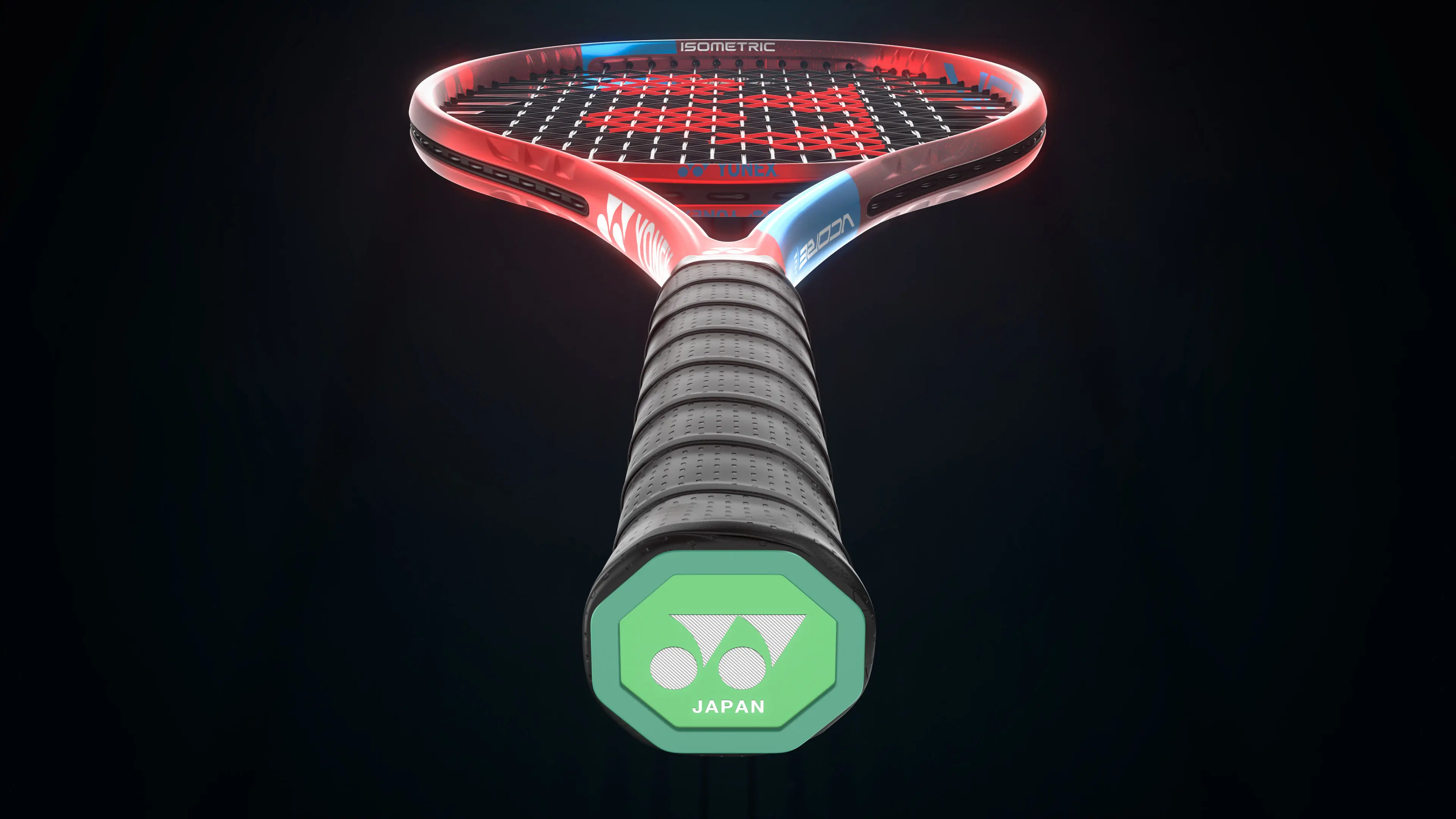 3D render of a red YONEX VCORE 100 tennis racket shown from the handle, with its green Japan end cap