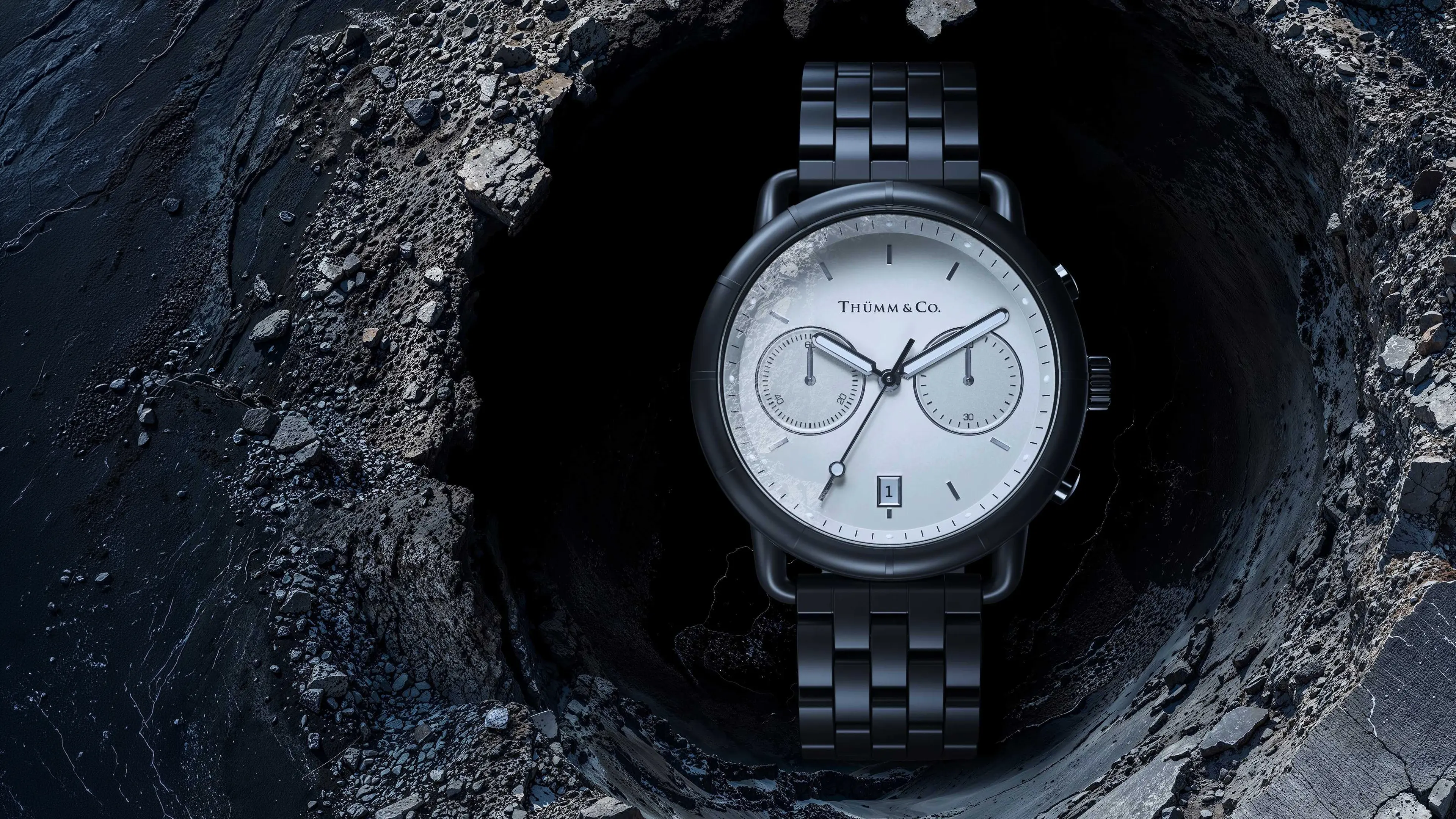 THÜMM & Co. chronograph watch nestled in a crater of black volcanic rock surrounded by dark water